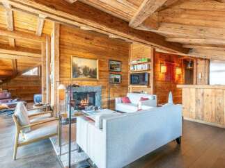 Experience the warmth and charm of this stunning wooden chalet.