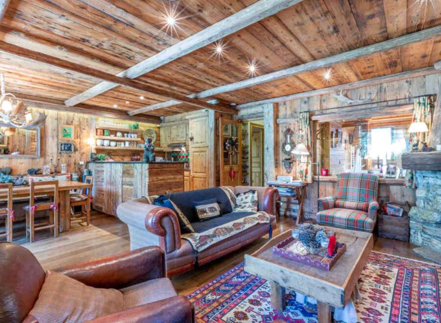 Step into rustic elegance with this stunning property, featuring a warm and inviting living space.