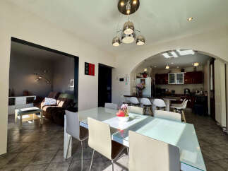 This stunning property boasts a modern open-plan design, perfect for entertaining and family living.