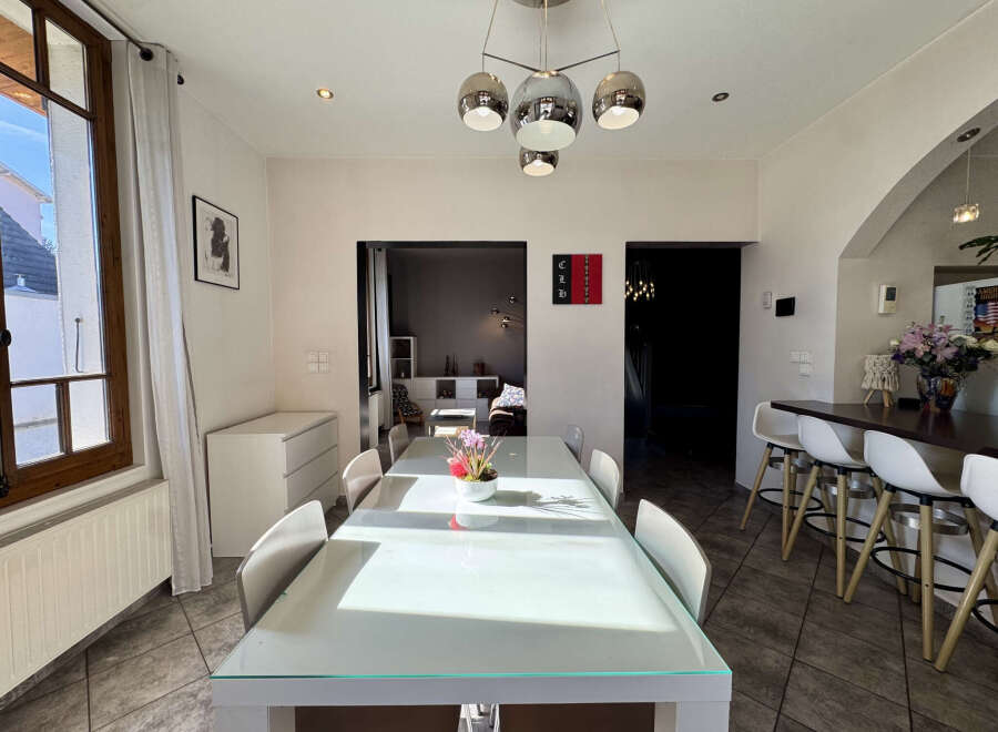 Step into this bright and airy dining room, perfect for entertaining.