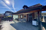 Discover this charming property featuring a spacious terrace perfect for outdoor dining and relaxation.