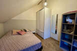 Discover the charm of this cozy bedroom, perfect for a peaceful retreat.