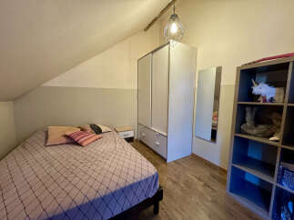 Discover the charm of this cozy bedroom, perfect for a peaceful retreat.