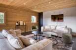 Experience the warmth and charm of this stunning living space, featuring exquisite wooden paneling throughout.