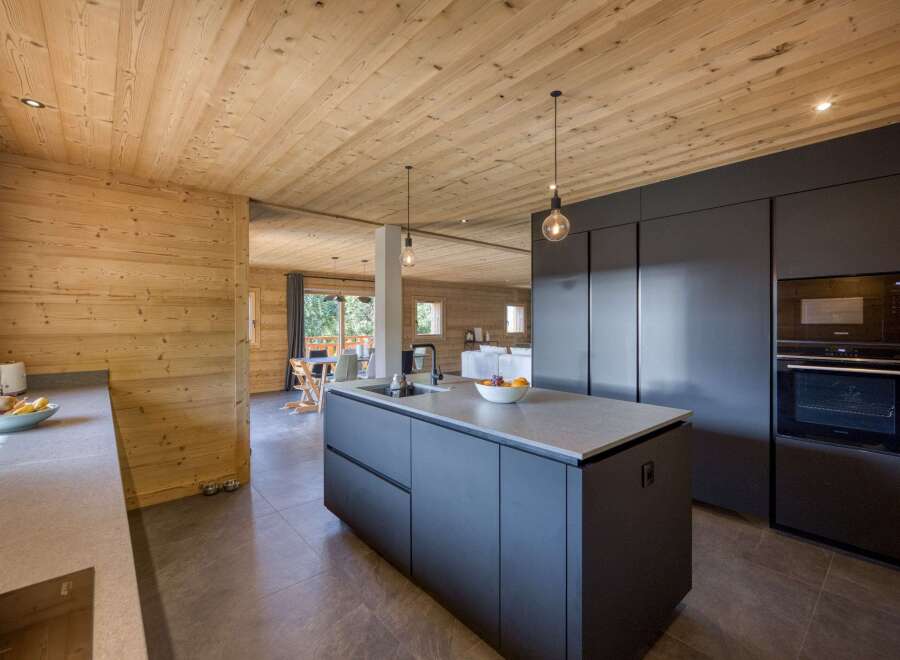 This stunning kitchen boasts a modern design with a touch of rustic charm.