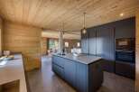 This stunning kitchen boasts a modern design with a touch of rustic charm.