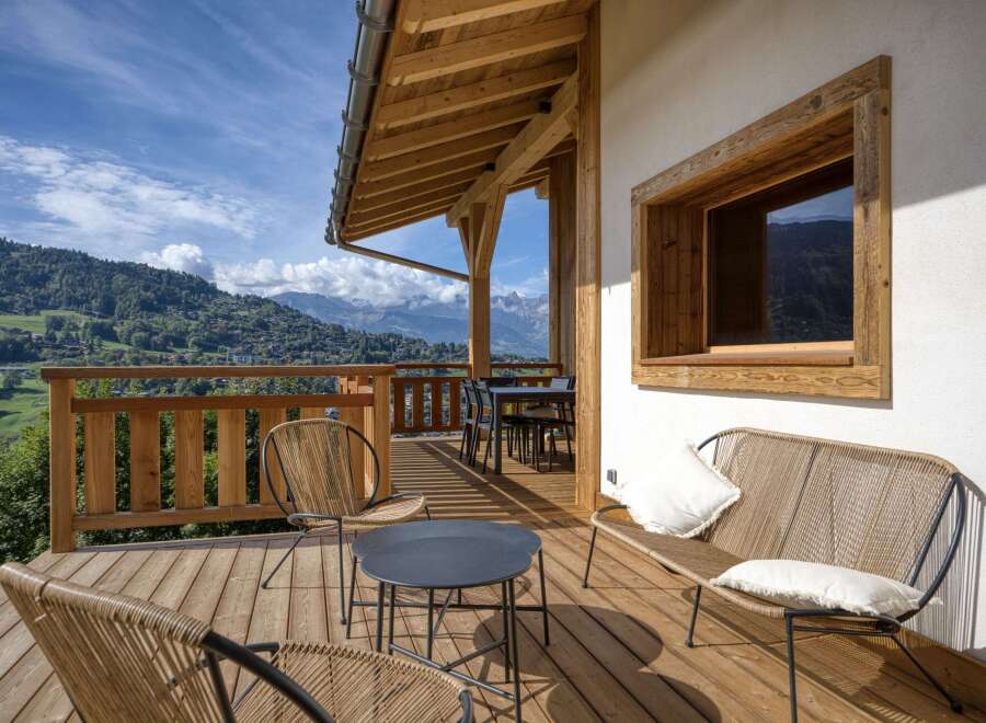 Enjoy breathtaking mountain views from this stunning outdoor deck.