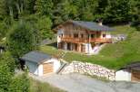 Discover a stunning chalet nestled in a serene, wooded landscape, offering a perfect blend of rustic charm and modern comfort.