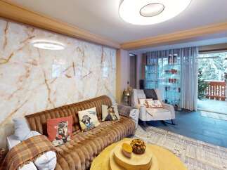 Experience luxury living in this stunning property, featuring a beautifully designed living room.