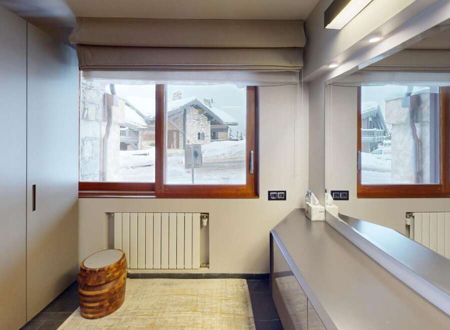 This stunning property boasts a modern bathroom with a view.