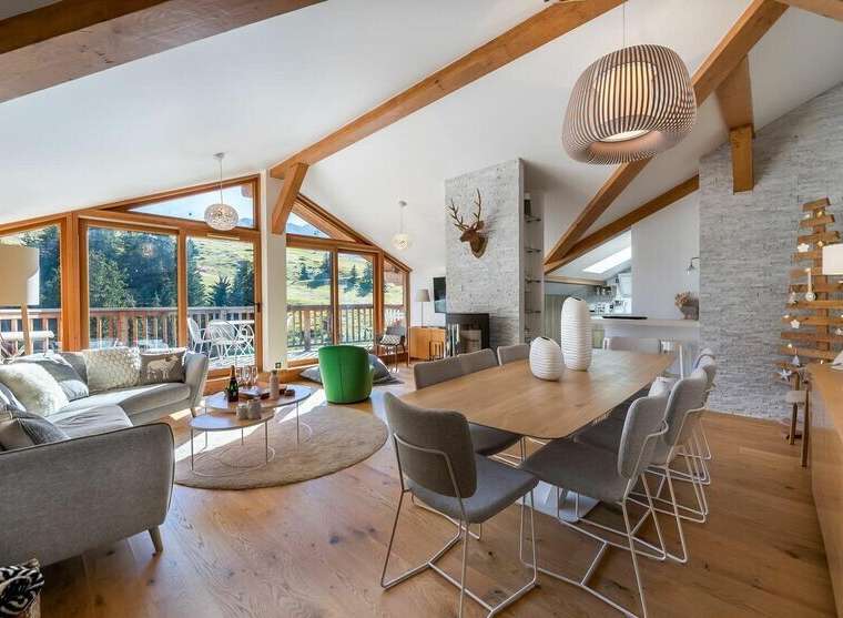 Experience luxury living in this stunning chalet, boasting a spacious open-plan design.