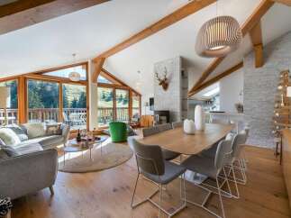 Experience luxury living in this stunning chalet, boasting a spacious open-plan design.