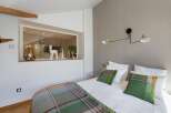 Discover a cozy bedroom retreat with a modern design.