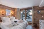 Experience the ultimate in alpine luxury with this stunning bedroom.