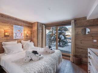 Experience the ultimate in alpine luxury with this stunning bedroom.