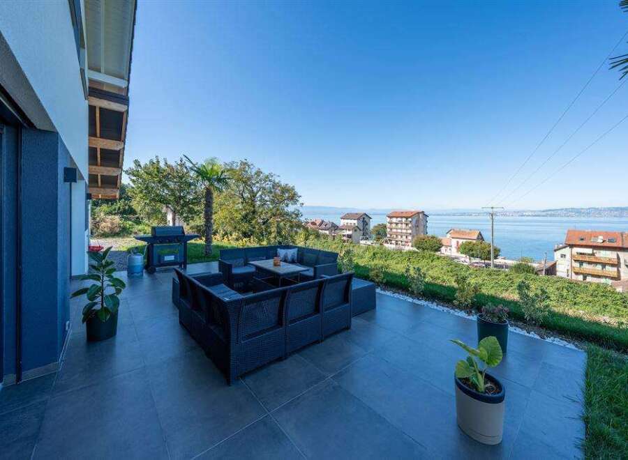 Enjoy stunning views from this luxurious outdoor living space.