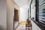This modern hallway boasts sleek design and functionality.