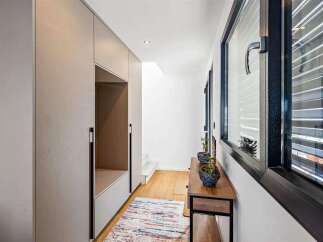 This modern hallway boasts sleek design and functionality.