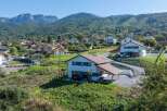 Discover this stunning property nestled in a picturesque landscape, offering breathtaking views of the surrounding mountains.