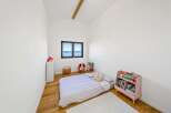 This charming bedroom offers a cozy and inviting atmosphere, perfect for a child's retreat.