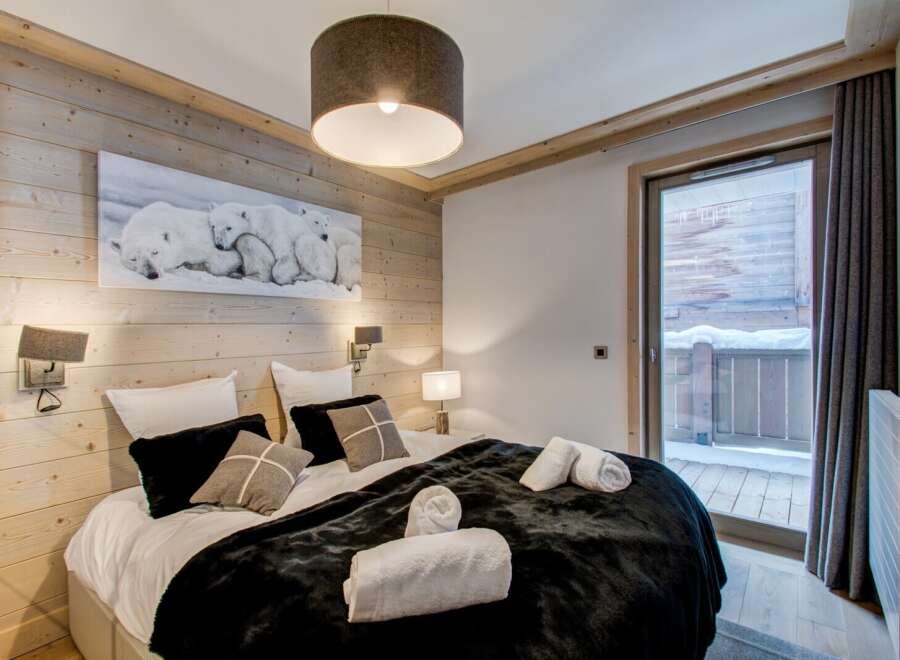 Experience cozy luxury in this stunning bedroom.