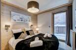 Experience cozy luxury in this stunning bedroom.
