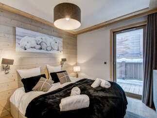 Experience cozy luxury in this stunning bedroom.