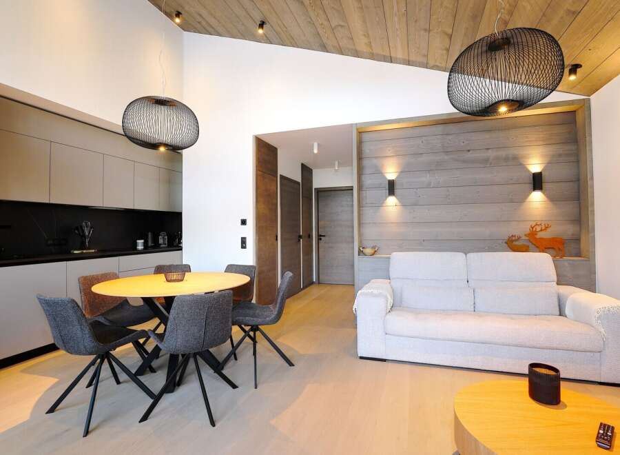 This modern apartment boasts a stylish open-plan living area, perfect for entertaining.