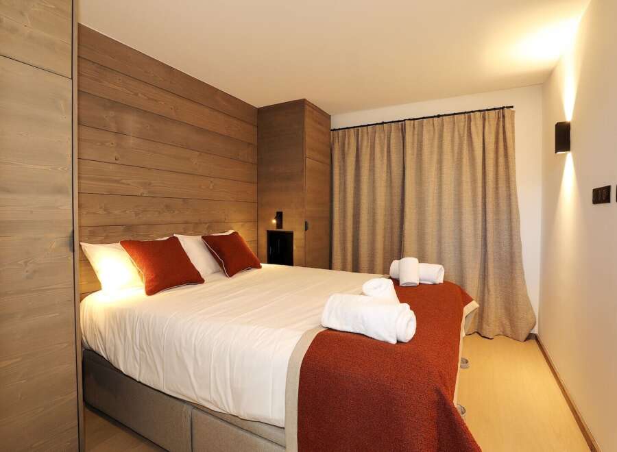 Experience luxury and comfort in this beautifully designed bedroom.