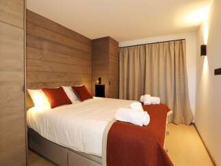 Experience luxury and comfort in this beautifully designed bedroom.