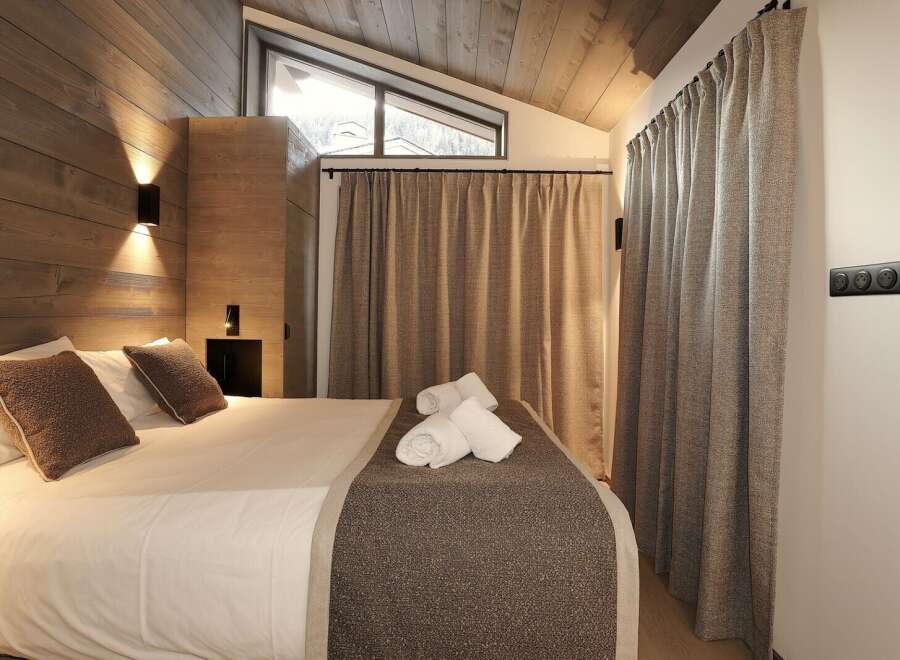 Experience luxury and comfort in this beautifully designed bedroom.