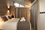 Experience luxury and comfort in this beautifully designed bedroom.