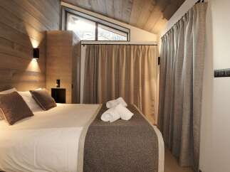 Experience luxury and comfort in this beautifully designed bedroom.
