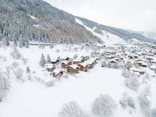 Discover your dream chalet nestled in a picturesque winter wonderland.