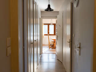 Step into this inviting hallway, showcasing a bright and airy atmosphere.