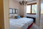 Discover the charm of this cozy bedroom, perfect for a relaxing retreat.