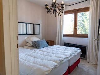 Discover the charm of this cozy bedroom, perfect for a relaxing retreat.