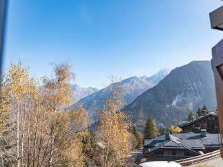 Enjoy breathtaking mountain views from this charming chalet.