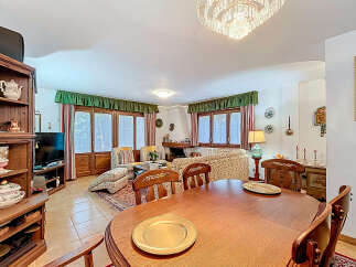 Step into this charming living space, perfect for relaxation and entertaining.