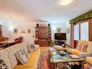 Step into this inviting living space, perfect for relaxation and entertaining.