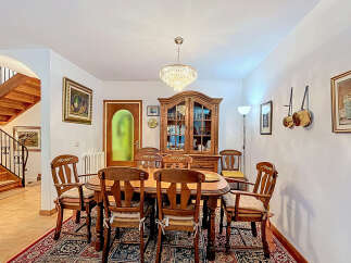 Step into this elegant dining room, perfect for hosting memorable gatherings.