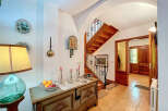 Step into this inviting entryway, showcasing a blend of rustic charm and timeless elegance.