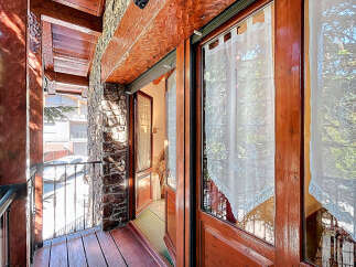 Discover the charm of this inviting balcony, perfect for enjoying the outdoors.