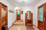 Step into a charming entryway with a touch of rustic elegance.