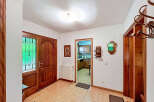Step into this inviting entryway, showcasing a warm and welcoming atmosphere.