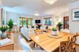 Step into this beautifully staged living and dining area, perfect for entertaining.
