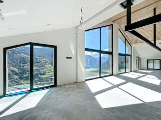 Experience breathtaking views in this modern, light-filled property.