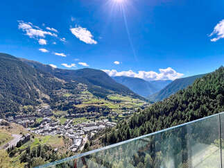 Experience breathtaking views from this stunning property nestled in the heart of the mountains.