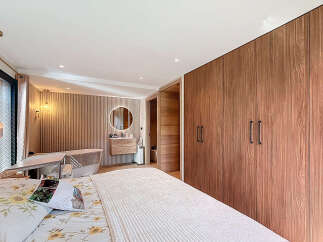 Step into luxury with this stunning bedroom featuring a modern design and elegant finishes.