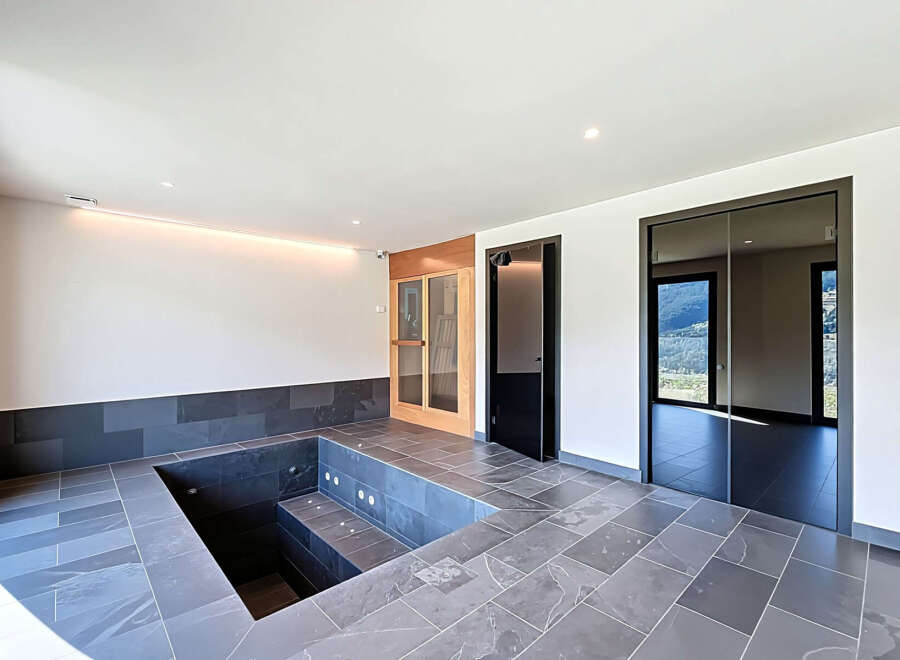 Discover luxury living in this stunning property featuring a private indoor pool.